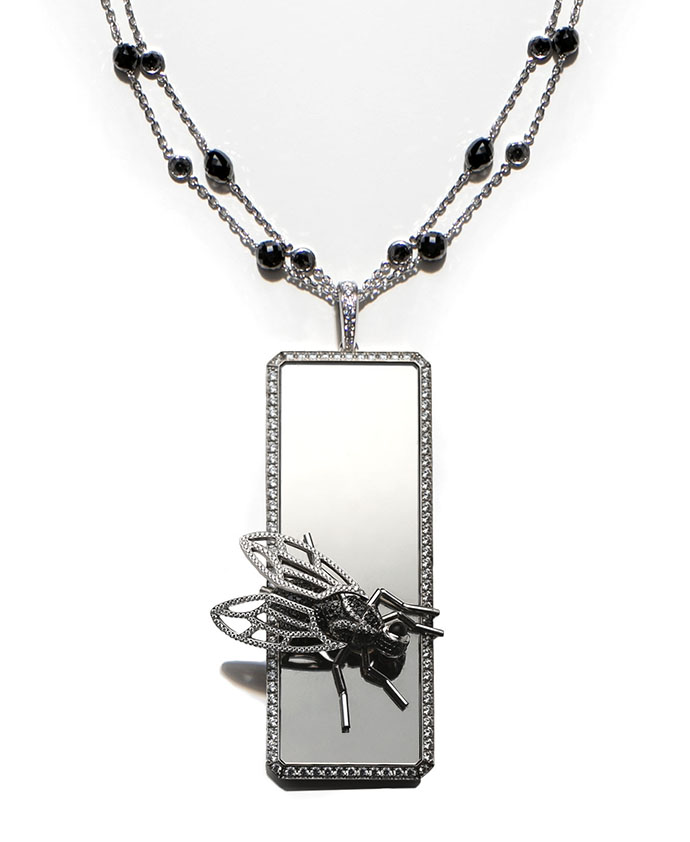 Колье Chopard Animal World из белого золота с черными (41.3 к) и бесцветными бриллиантами и ониксом 