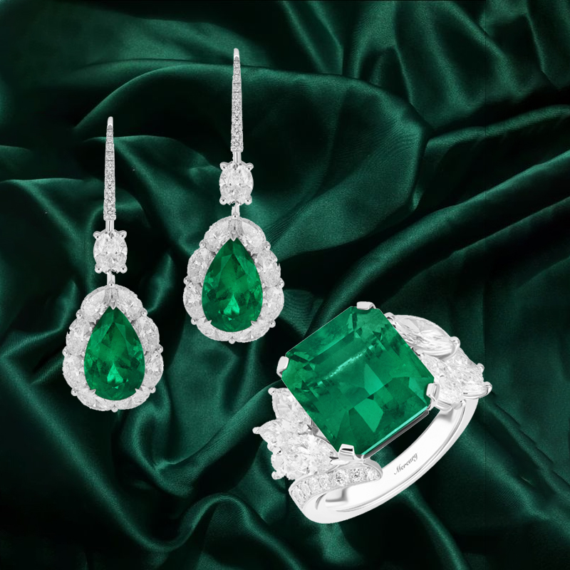 Кольцо и серьги Mercury Color из белого золота с бриллиантами и изумрудами