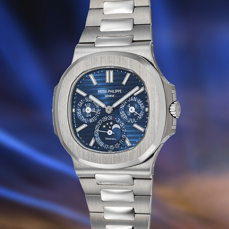 Часы Patek Philippe Nautilus Perpetual Calendar Tiffany & Co. Ref. 5740/1G-001 в 40 мм корпусе из белого золота с вечным календарем и указателем фаз Луны