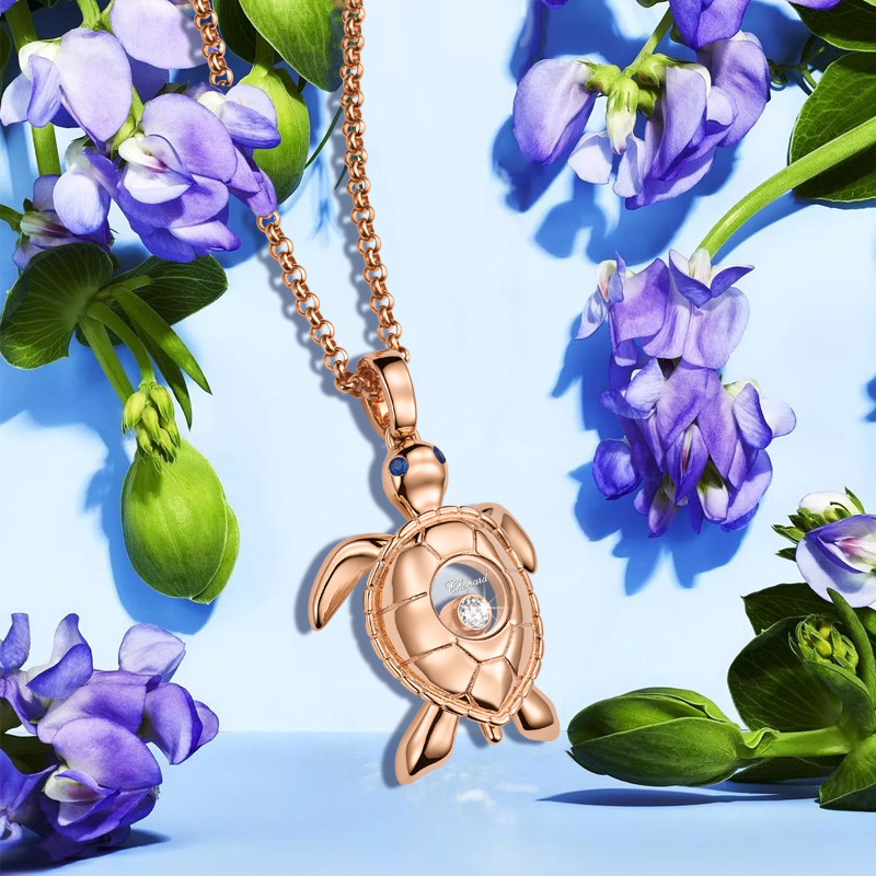 Кулон Chopard Happy Diamonds из розового золота с сапфирами и плавающим бриллиантом