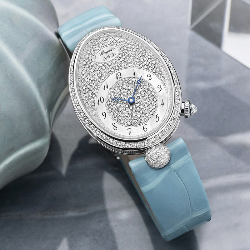 Часы Breguet Reine de Naples в 38,45x28,45 мм корпусе из белого золота, украшенные бриллиантами, с эксцентром