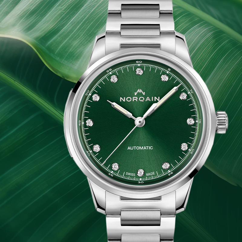 Часы NORQAIN Freedom 60 Emerald Green Diamond в 39 мм корпусе из стали с бриллиантовыми метками