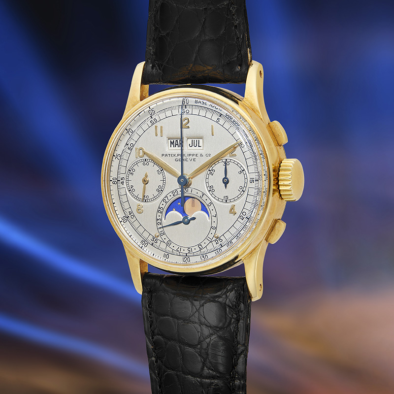 Хронограф Patek Philippe Ref. 1518 в 35 мм корпусе из желтого золота с вечным календарем и указателем фаз Луны