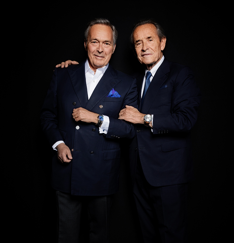 Сопрезидент Chopard Карл-Фридрих Шойфеле в часах Chopard Alpine Eagle и амбассадор Chopard Джеки Икс в часах Chopard Mille Miglia