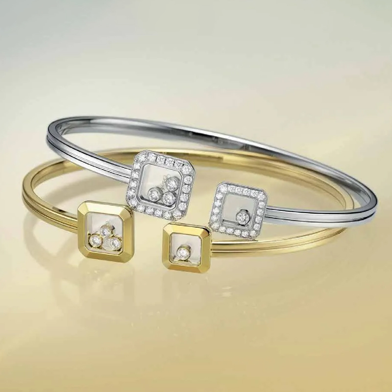 Браслеты Chopard Icons из белого и желтого золота с статичными и плавающими бриллиантами 