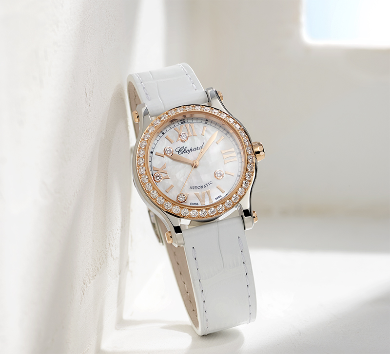 Часы Chopard Happy Sport в 30 мм корпусе из стали и розового золота с бриллиантами на корпусе и 5 плавающими бриллиантами внутри