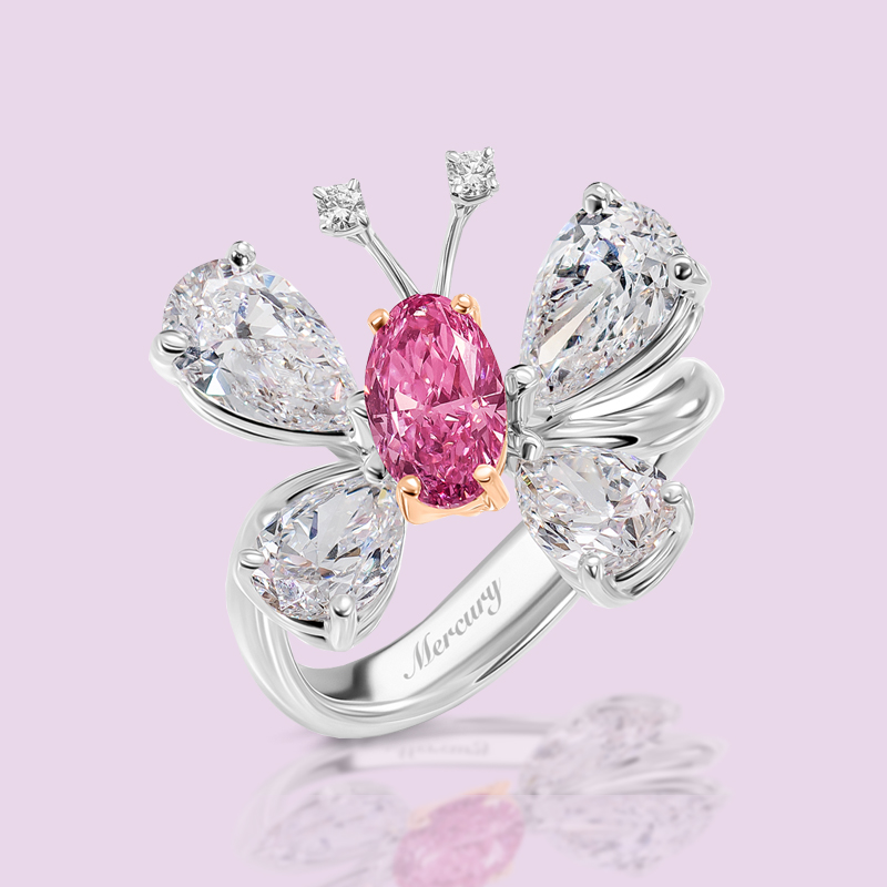 На фото: кольцо Mercury Classic из белого и розового золота с прозрачными и розовым бриллиантом