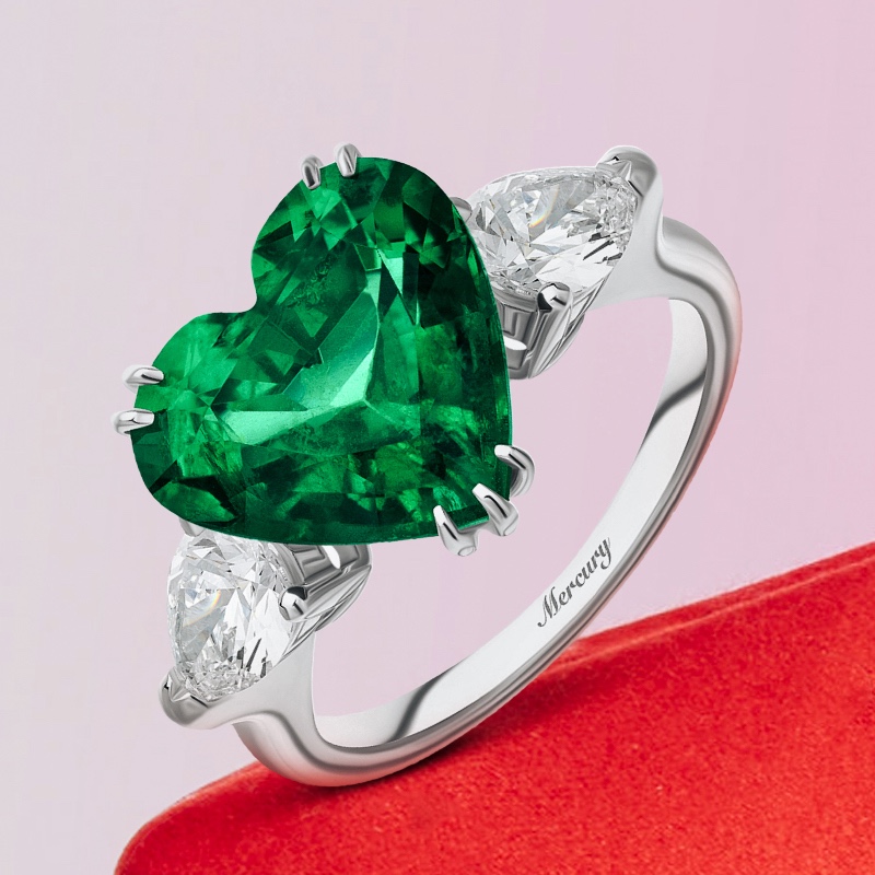 Кольцо Mercury Color из белого золота с бриллиантами и изумрудом