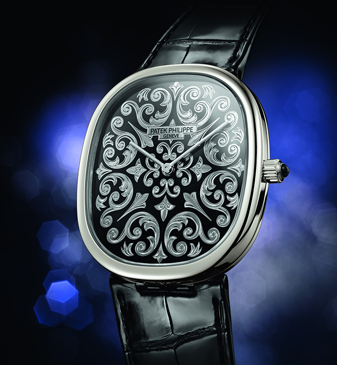 Лимитированная модель Golden Ellipse Ref.5738/50 в корпусе из платины с узором, выгравированным вручную на пластине циферблата из белого золота
