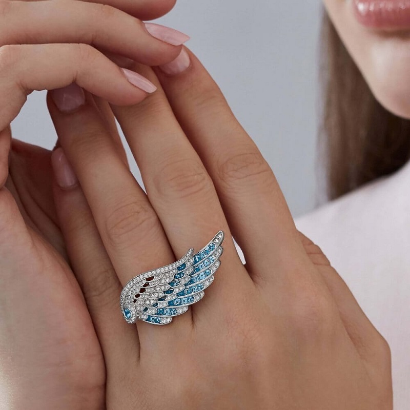 Garrard-Wings-Embrace-jewellery-collection-Across-the-Finger-Aquamarine-and-Diamond-Ring-In-18ct-White-Gold-2016579-scaled-1000x1000.jpg