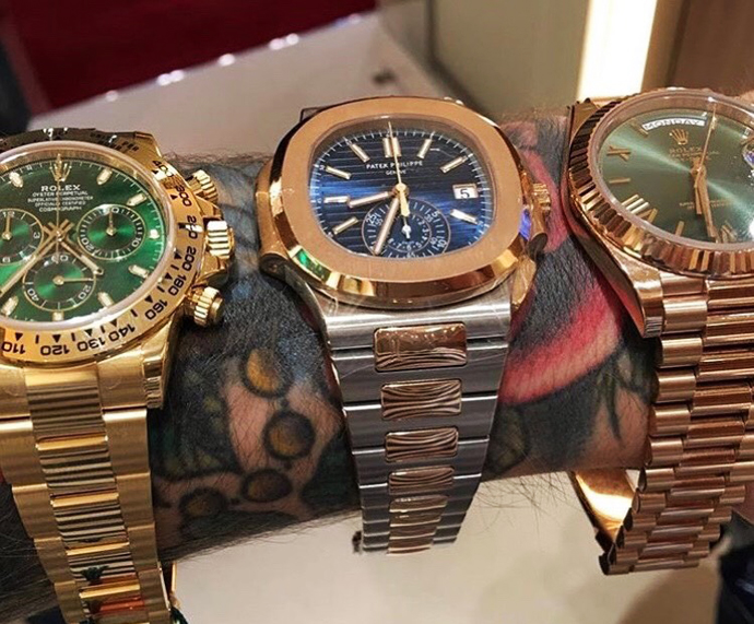 Часы Rolex Cosmograph Daytona 40 в корпусе из желтого золота, часы Patek Philippe Nautilus в корпусе из стали и розового золота и часы Rolex Oyster Perpetual Day-Date 40 в корпусе из золота Everose